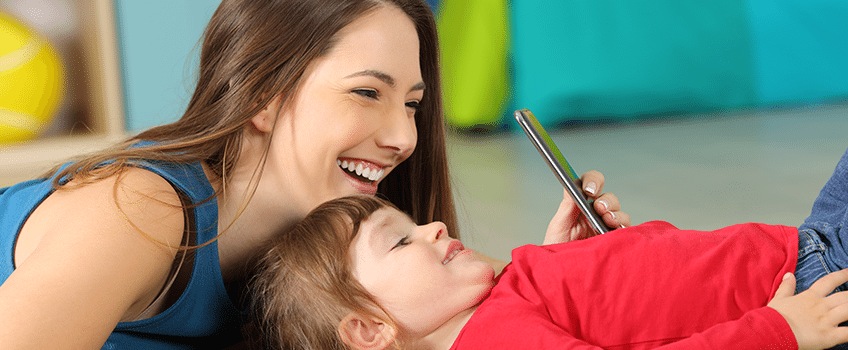 5 Simple Ways to Avoid Fake Mom Influencers 5 Simple Ways to Avoid Fake Mom Influencers - Mother and Child on Phone